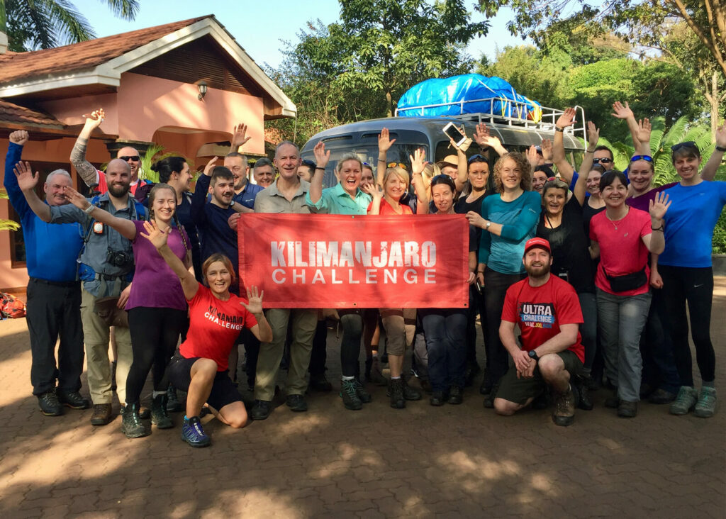 Kilimanjaro Challenge Sign Group Picture before trekking